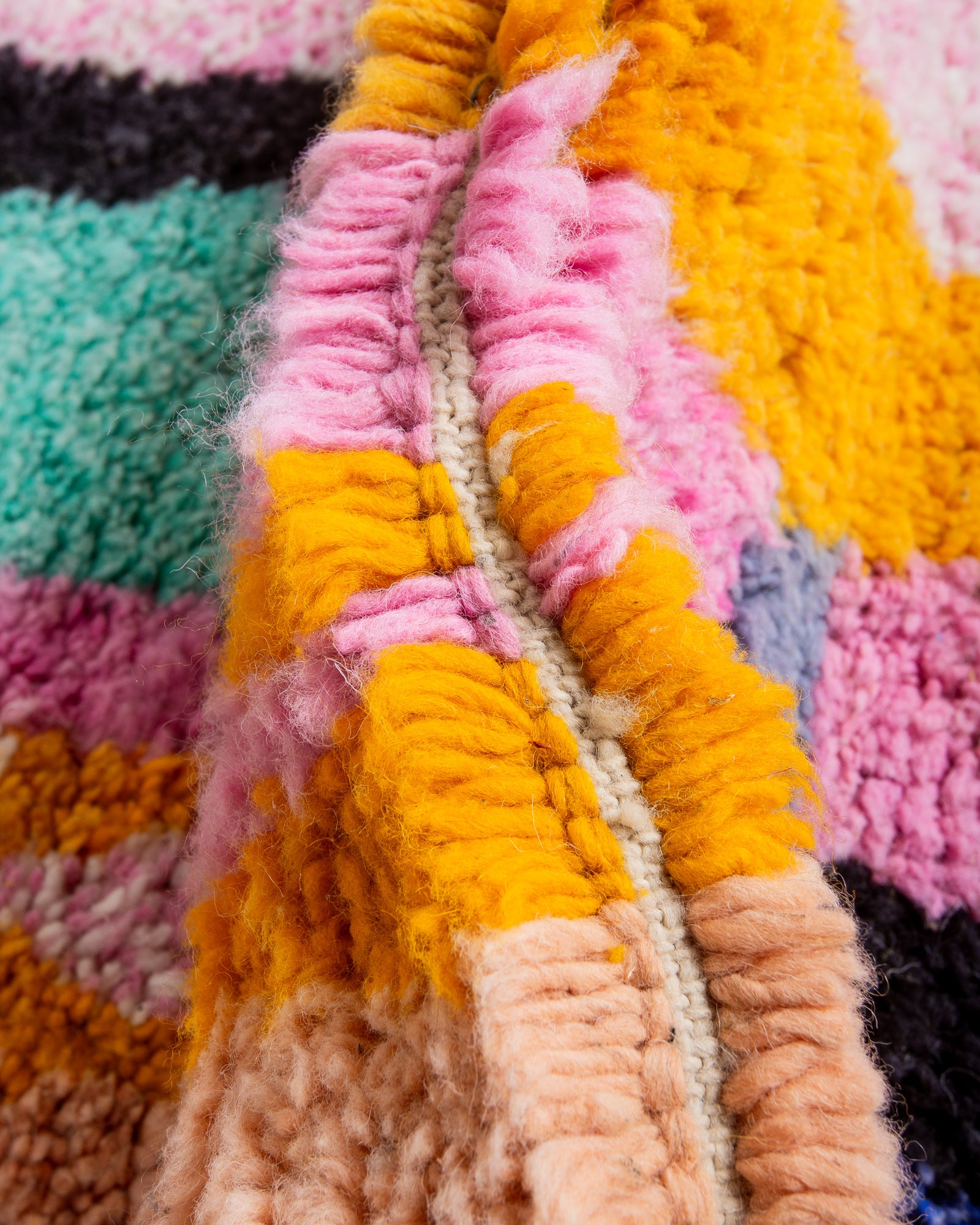 Modern, designer, handcrafted Berber rug from Morocco. Beniourain carpet with beautiful colours and patterns and fluffy wool texture.
